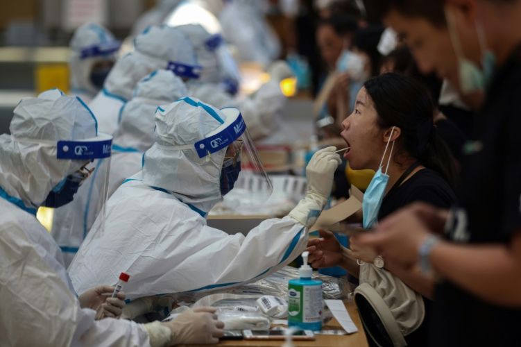 medical-worker-performs-covid-test.jpg