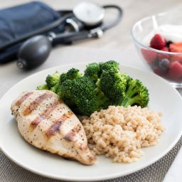 DASH-style meal of grilled chicken, broccoli, brown rice, berries and yogurt